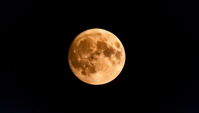 Full Moon Glowing In The Night Sky