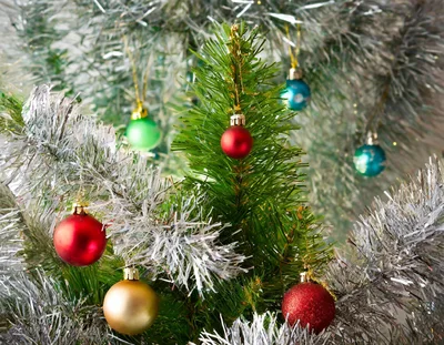 Small Christmas Tree Decorated With Colorful Ornaments