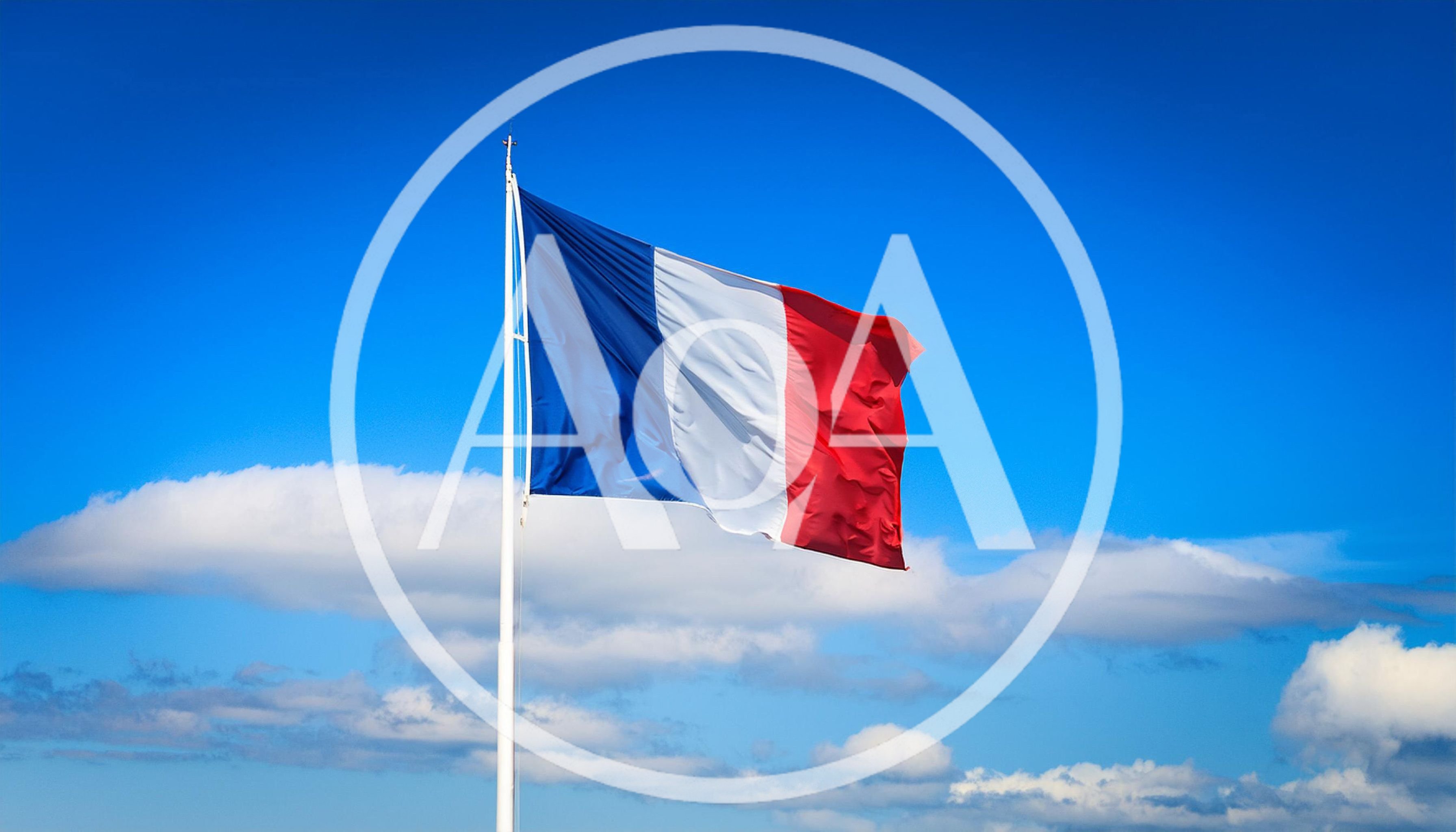 French Flag Waving Against A Clear Blue Sky