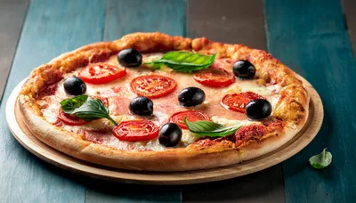 Fresh Homemade Pizza With Tomatoes Olives And Basil