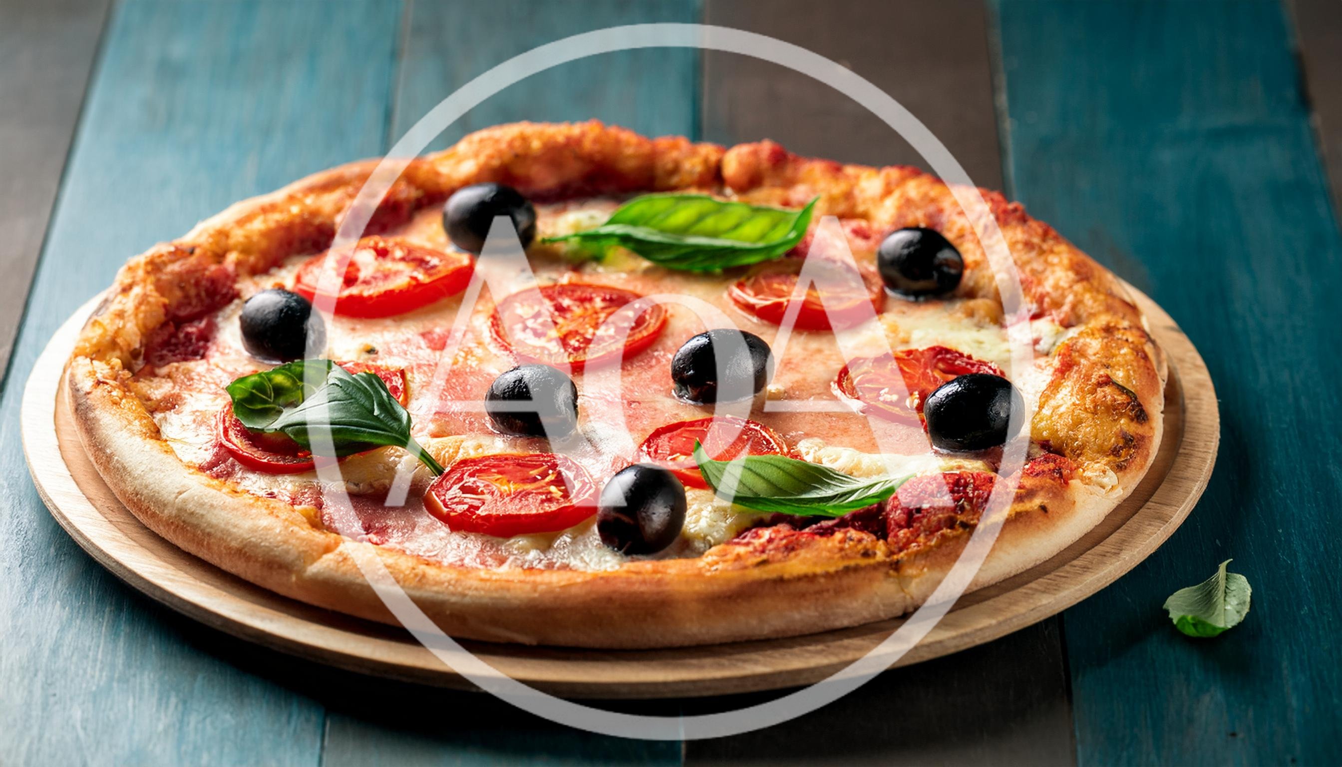 Fresh Homemade Pizza With Tomatoes Olives And Basil