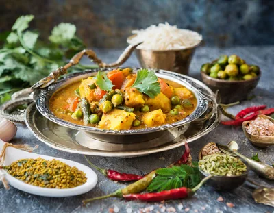 Traditional Indian Vegetable Curry With Spices And Rice