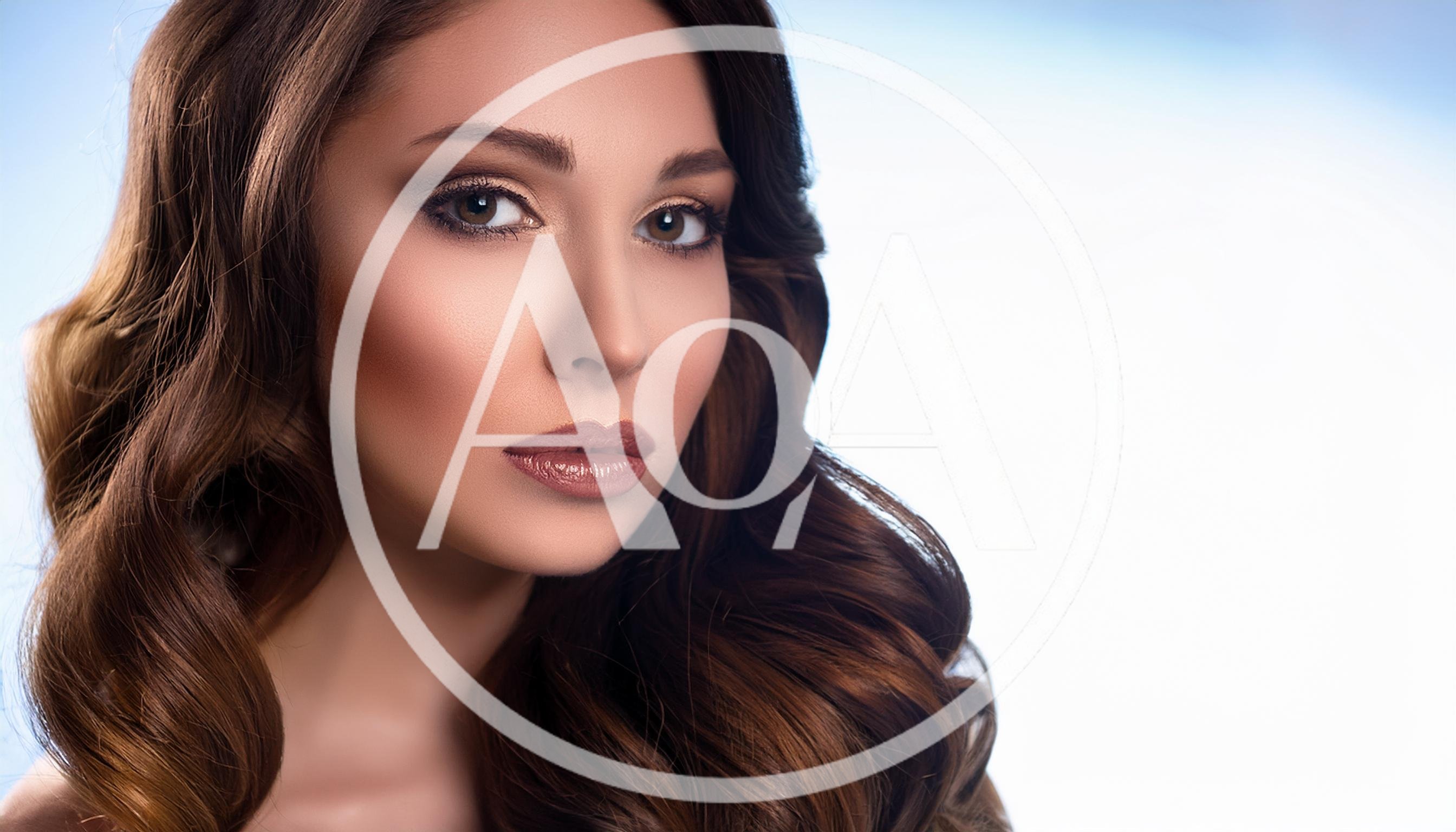 Portrait Of A Beautiful Woman With Wavy Brown Hair