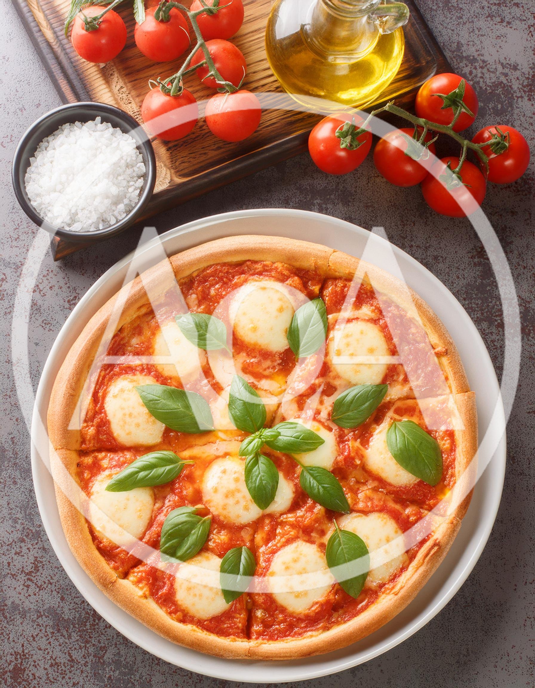 Fresh Margherita Pizza With Basil And Cherry Tomatoes