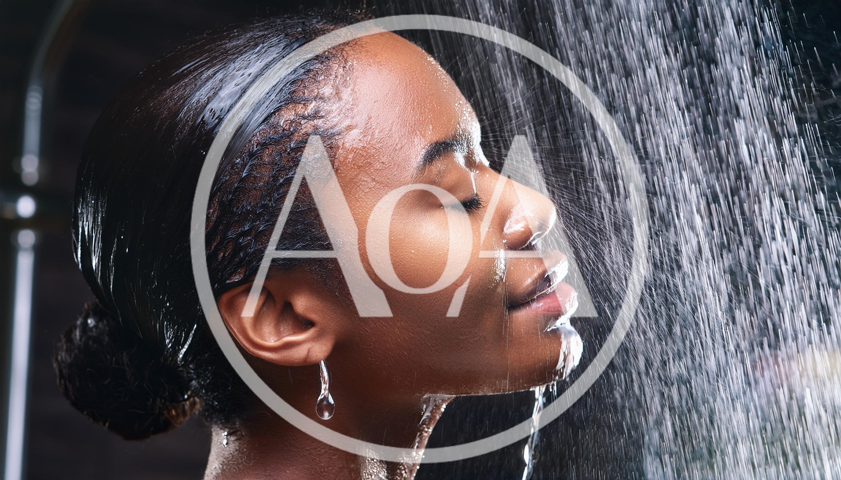 Young Black Woman Taking A Refreshing Shower