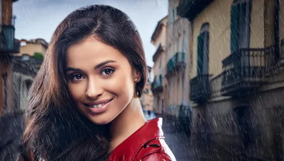 Portrait Of A Smiling Woman In A Red Jacket