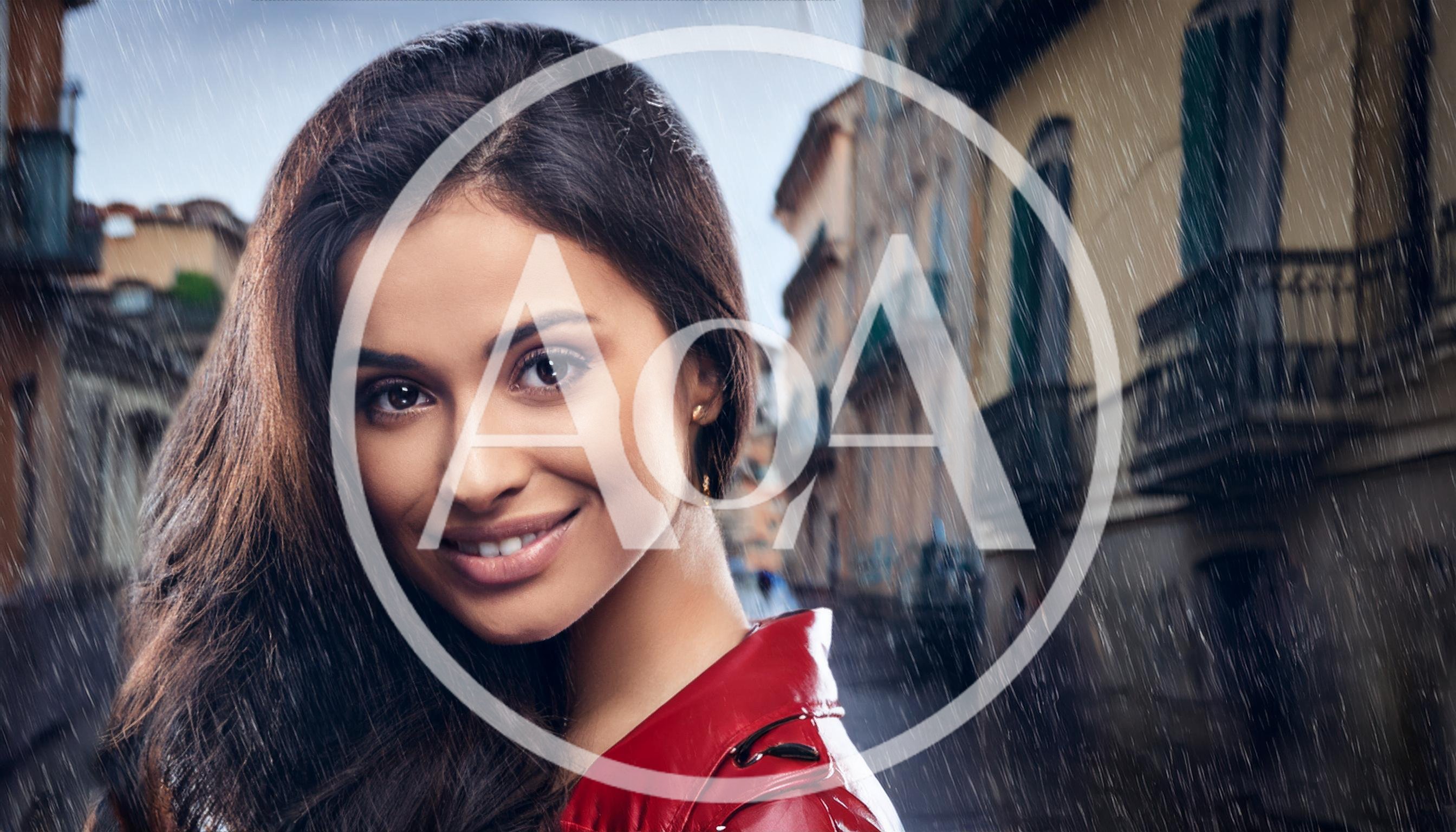 Portrait Of A Smiling Woman In A Red Jacket