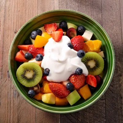 Fresh Fruit Salad Bowl With Creamy Yogurt Topping