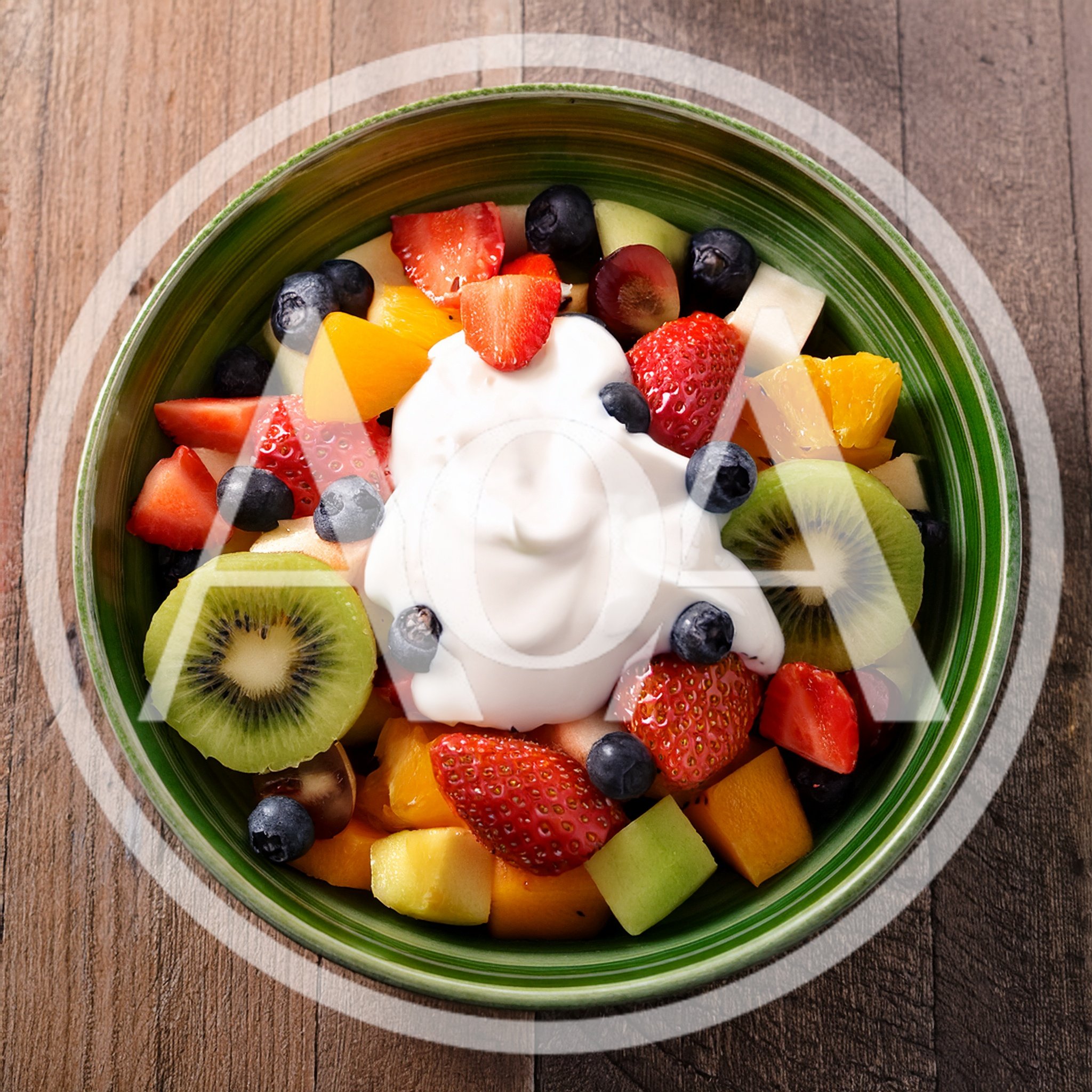 Fresh Fruit Salad Bowl With Creamy Yogurt Topping