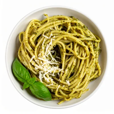 Spaghetti With Pesto Sauce And Parmesan Cheese