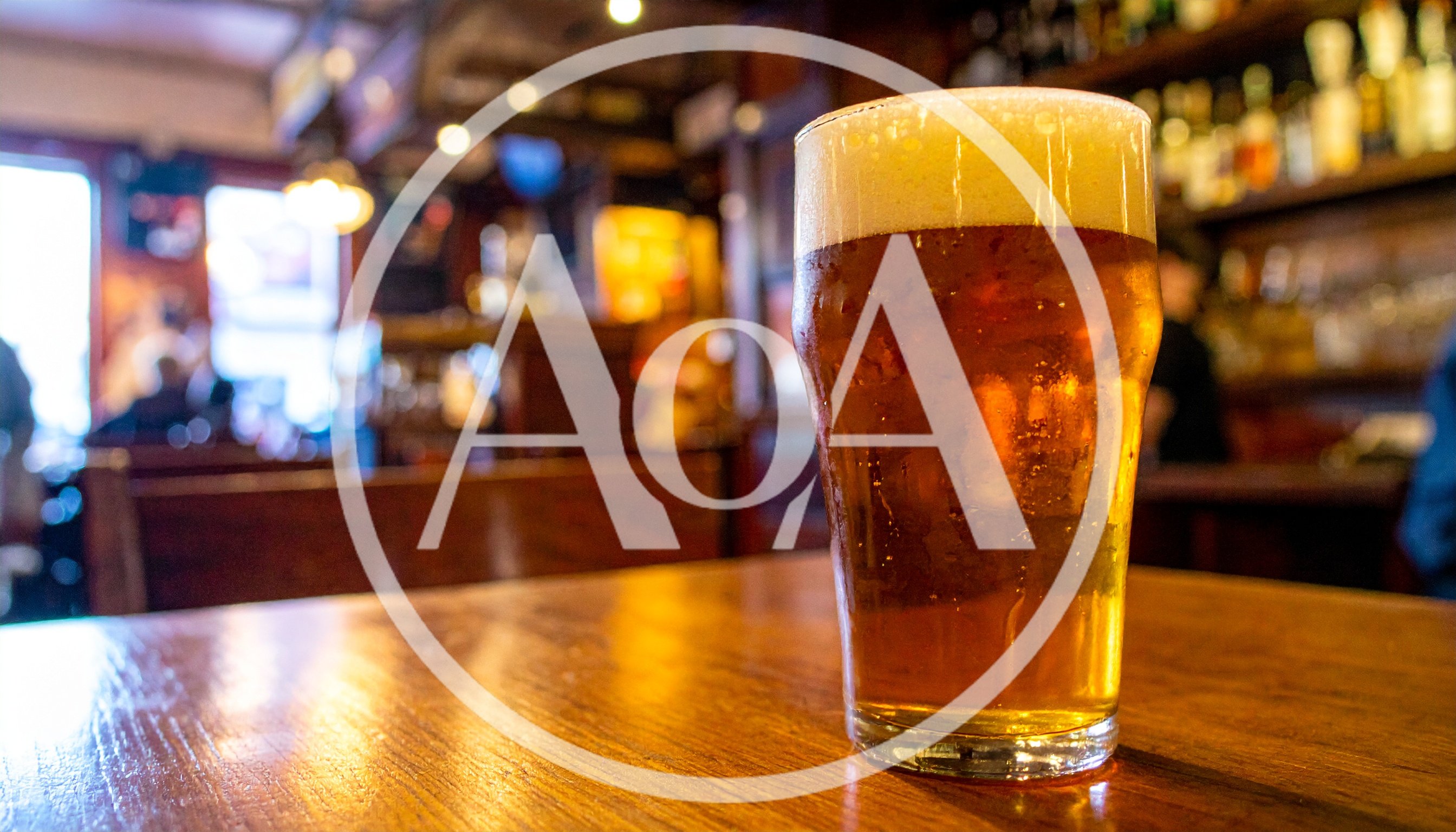 Pint Of Golden Beer On A Pub Table