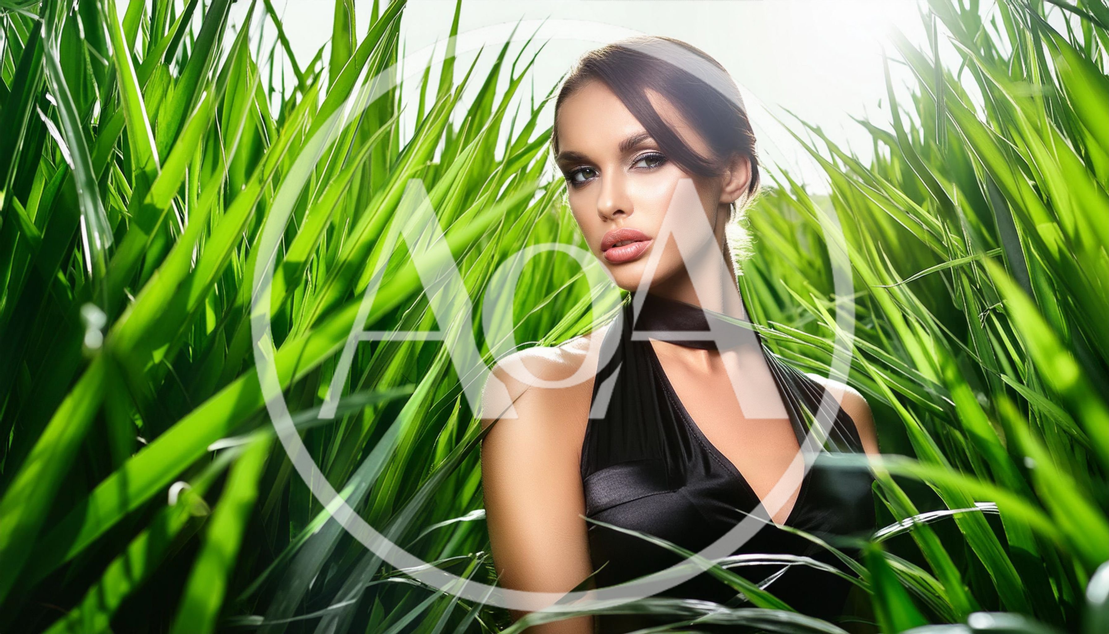 Beautiful Woman Posing In Lush Green Grass