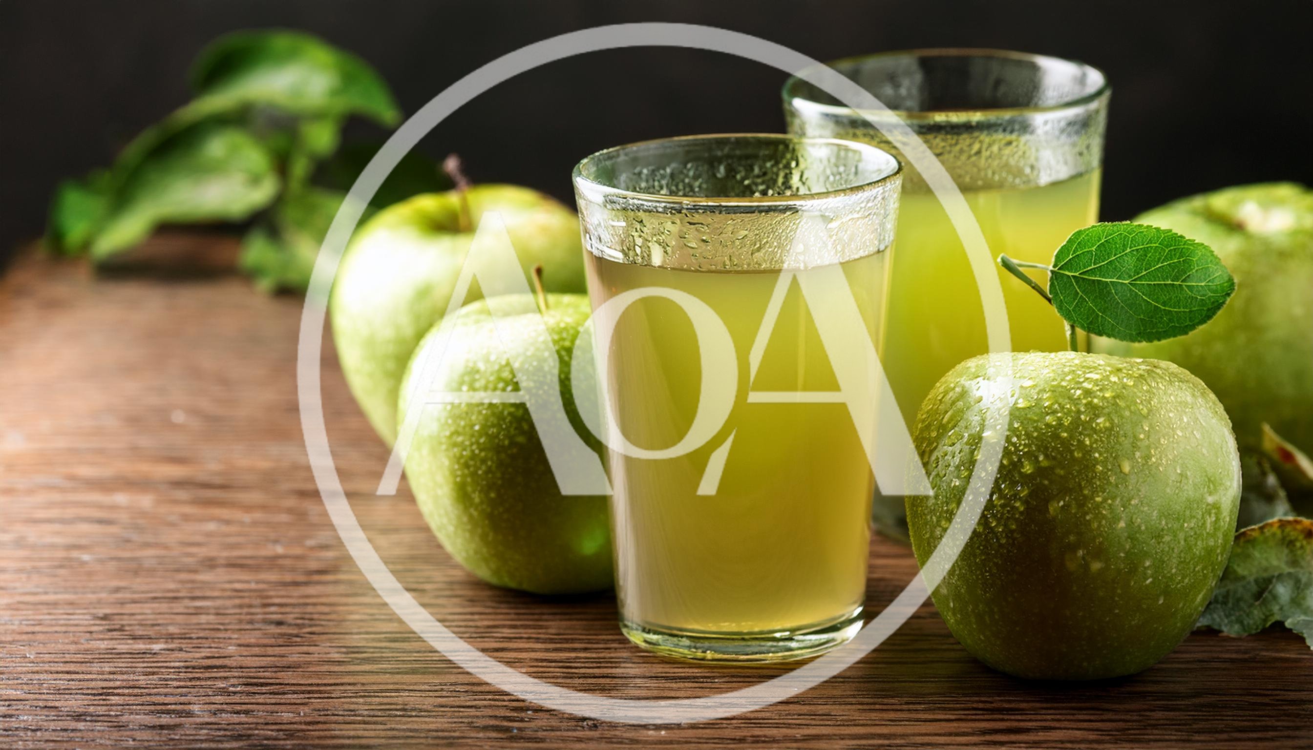 Fresh Green Apple Juice In Glasses With Whole Apples