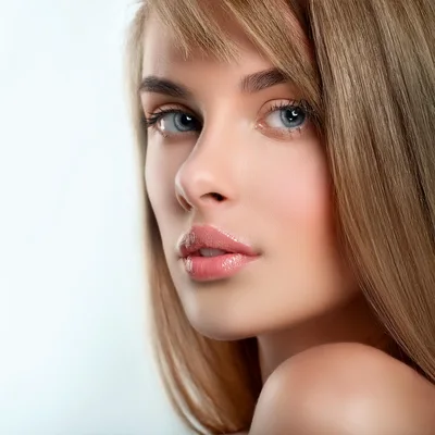Portrait Of A Beautiful Young Woman With Blonde Hair