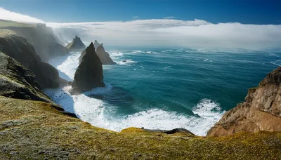 Dramatic Sea Stacks Along The Rugged Irish Coastline