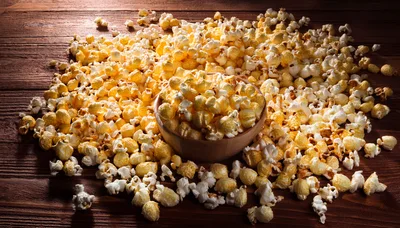 Wooden Bowl Filled With Fresh Buttery Popcorn