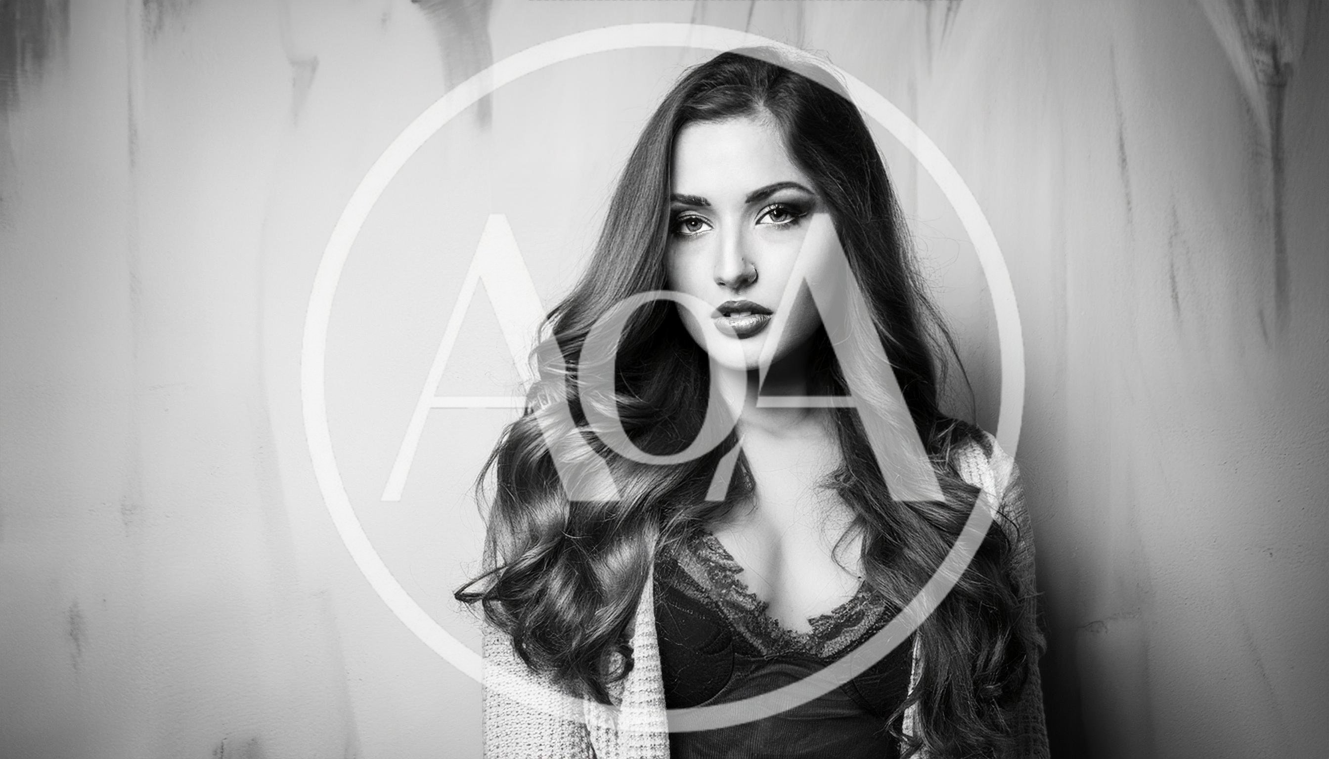 Portrait Of A Beautiful Young Woman With Long Hair
