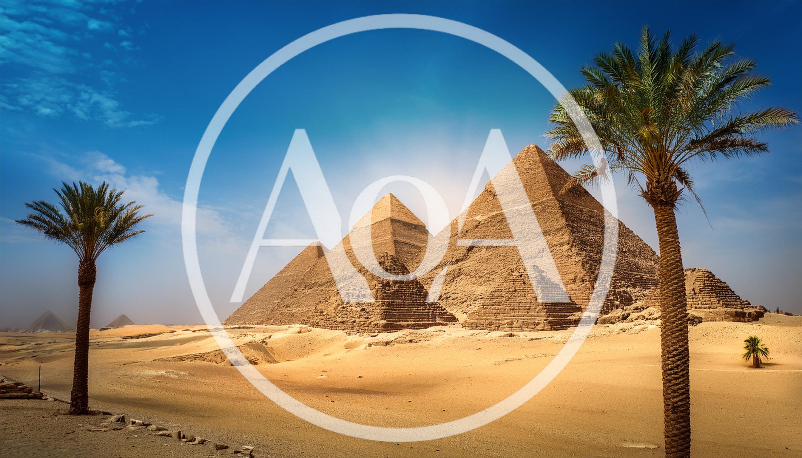 The Great Pyramids Of Giza Under A Clear Blue Sky