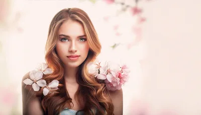 Portrait Of A Beautiful Young Woman With Spring Flowers