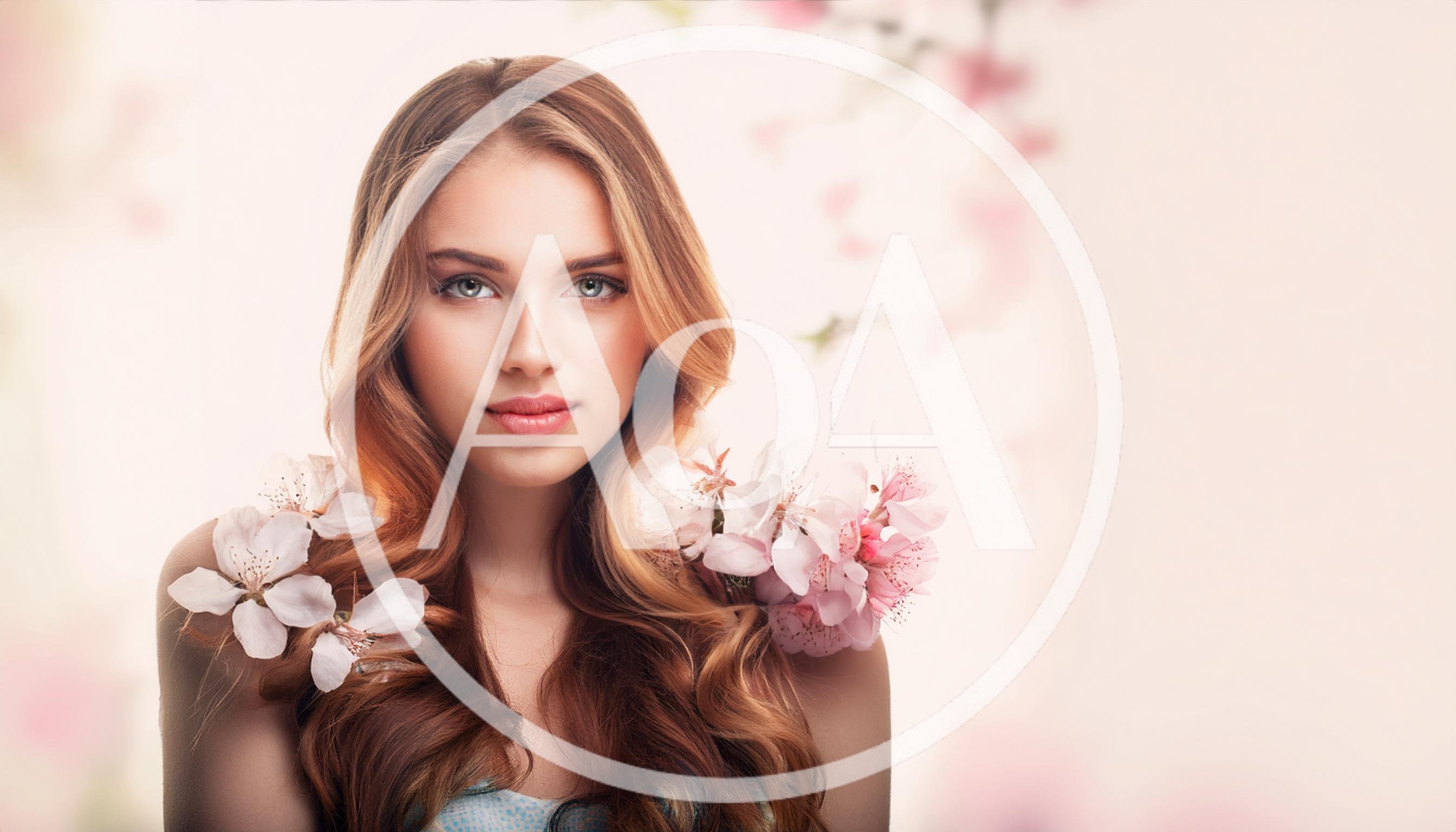 Portrait Of A Beautiful Young Woman With Spring Flowers