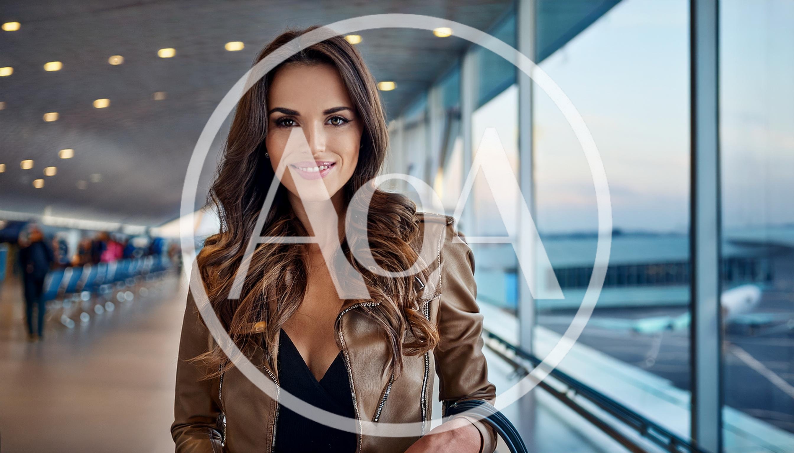 Beautiful Woman Standing In A Modern Airport Terminal
