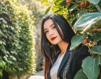 Portrait Of A Young Woman In A Garden