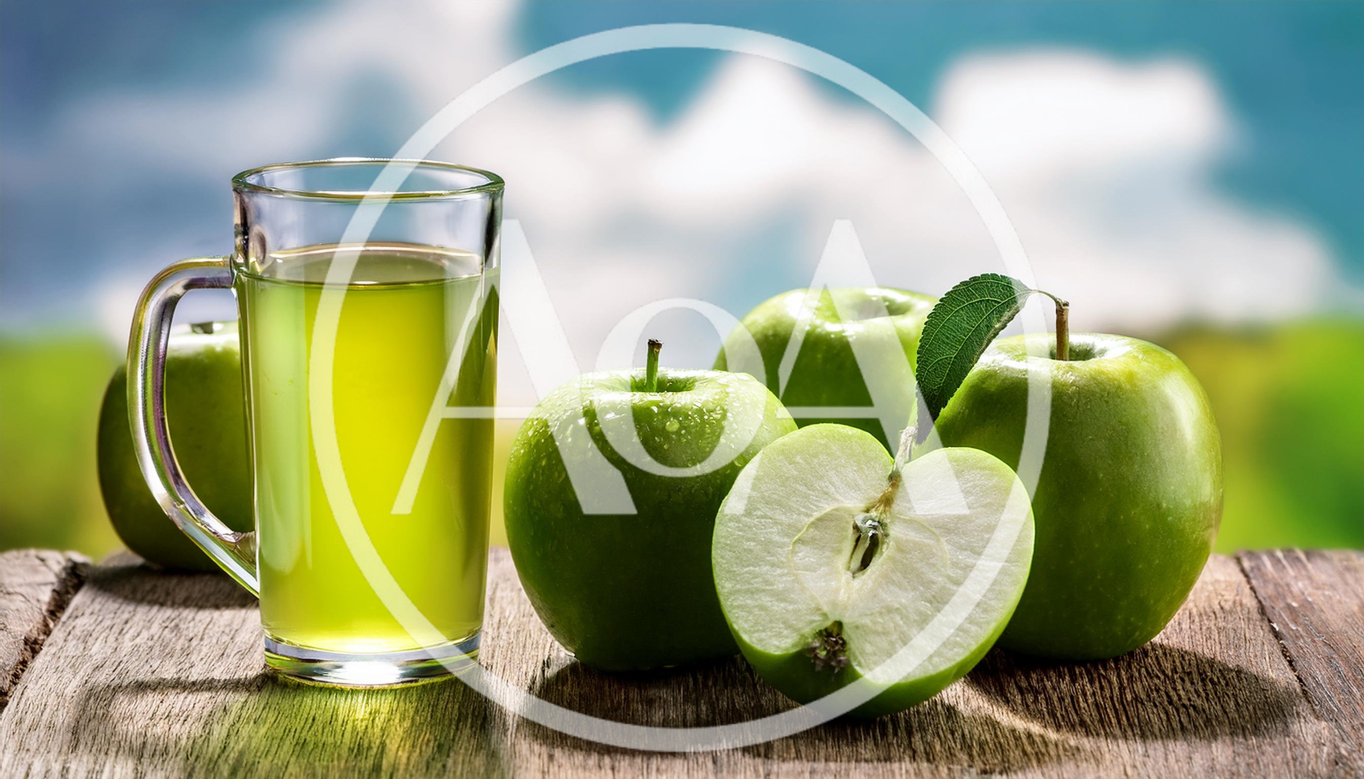 Glass Of Fresh Green Apple Juice With Whole Apples