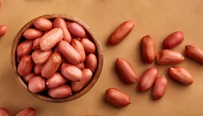 Raw Peanuts In A Wooden Bowl