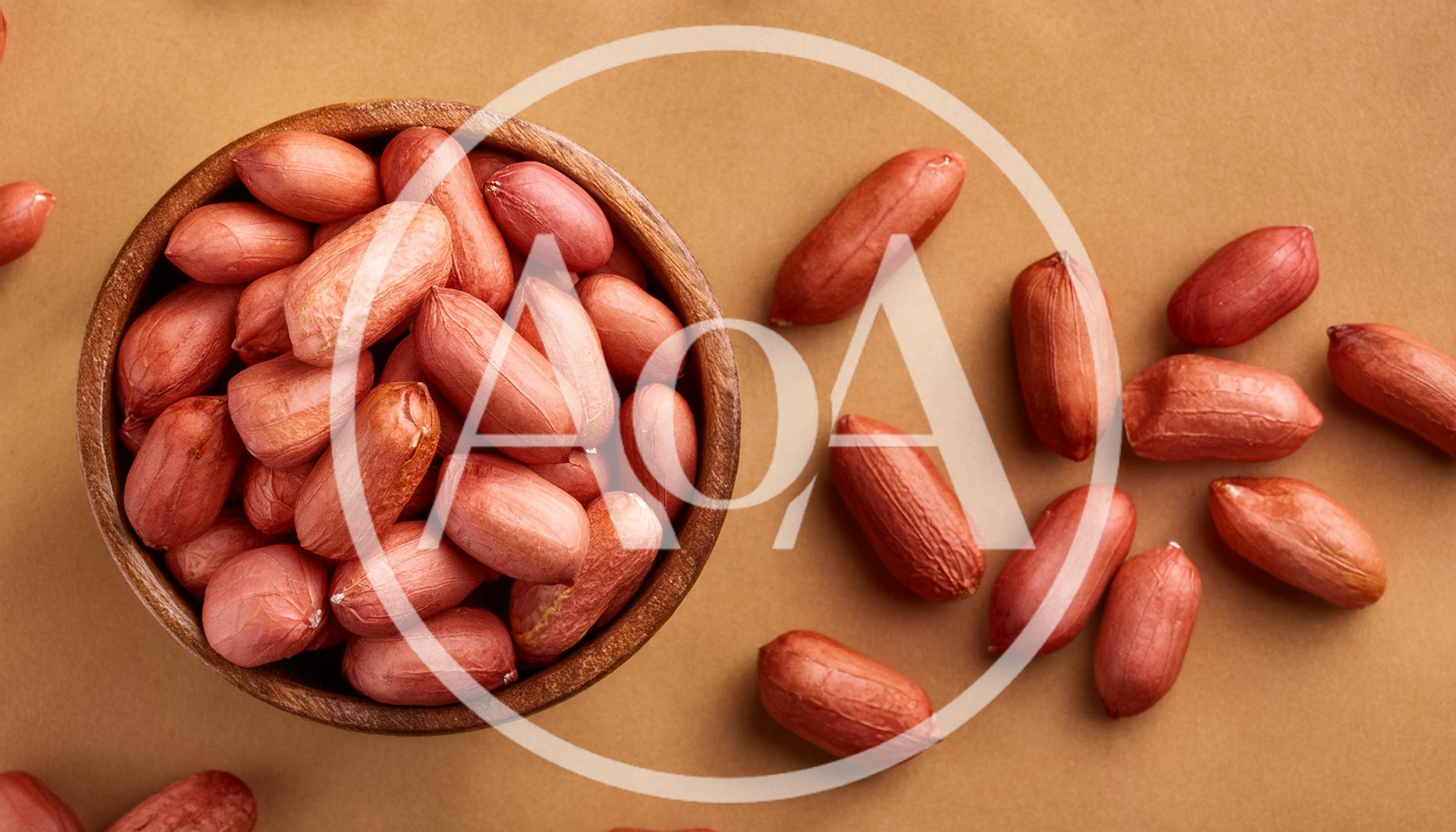 Raw Peanuts In A Wooden Bowl