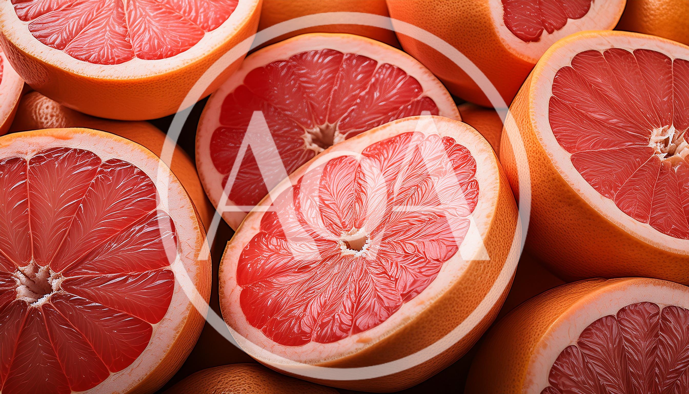Fresh Halved Grapefruits Arranged In A Pile