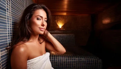 Beautiful Woman Relaxing In A Steam Sauna