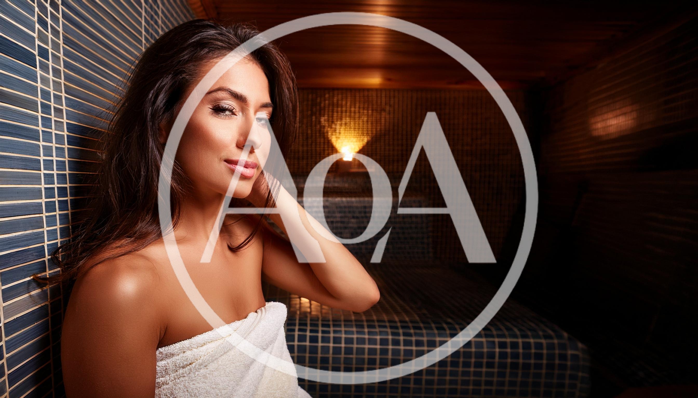 Beautiful Woman Relaxing In A Steam Sauna