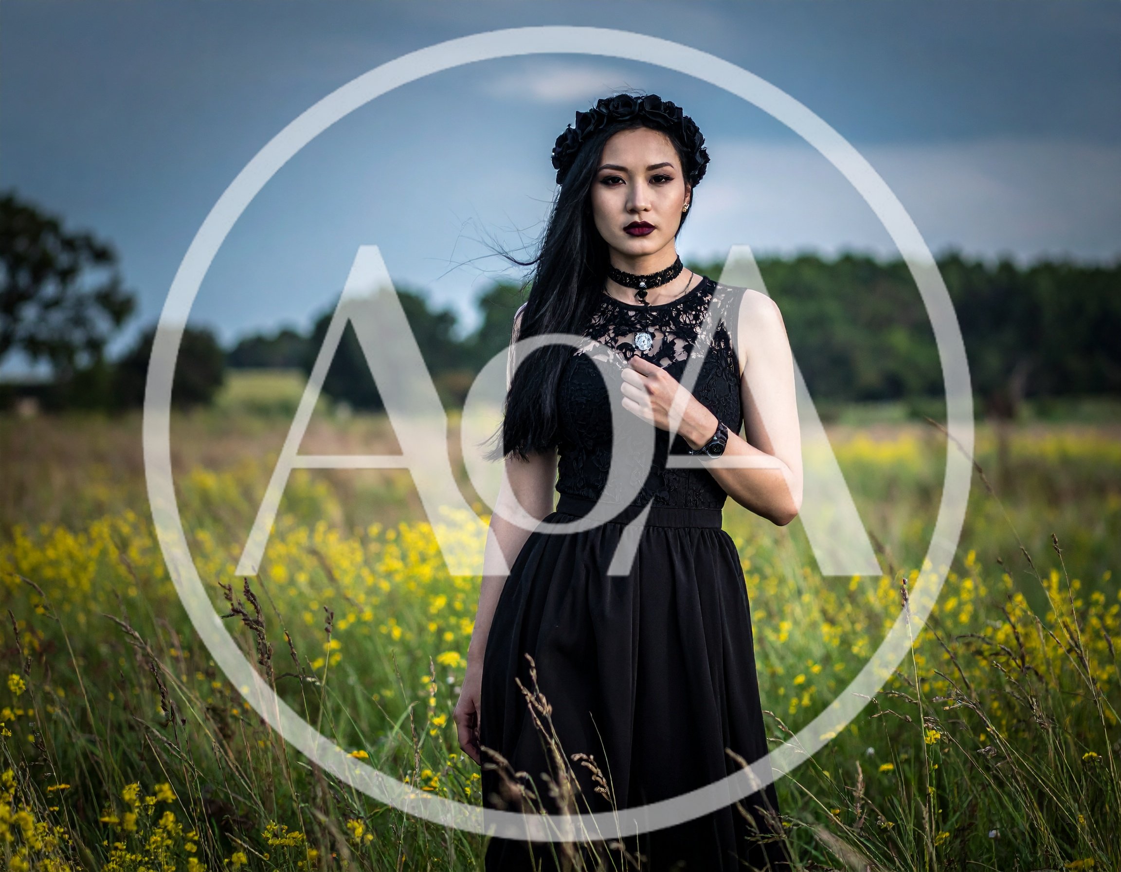 Gothic Woman Standing In A Wildflower Meadow