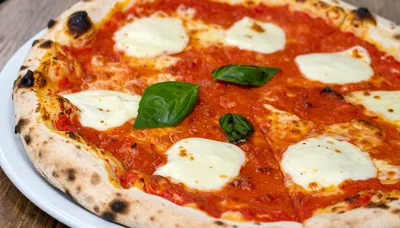Freshly Baked Neapolitan Margherita Pizza On A Plate