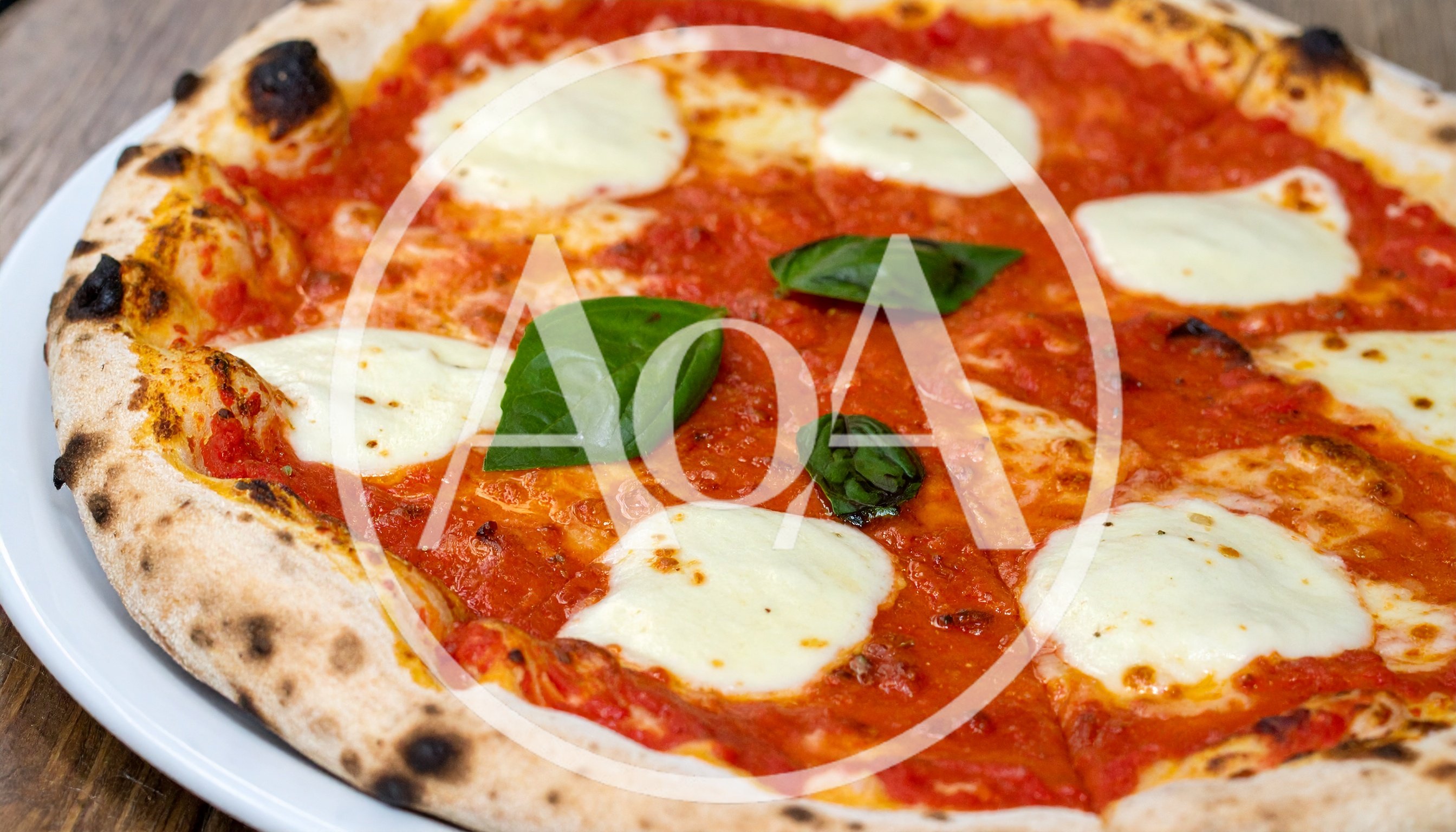 Freshly Baked Neapolitan Margherita Pizza On A Plate
