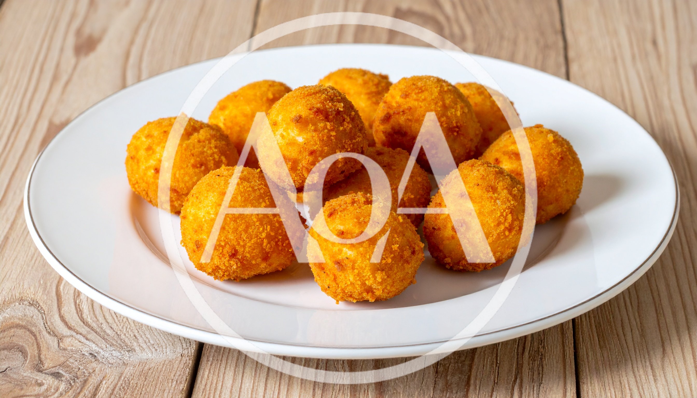 Fried Cheese Balls on a White Plate