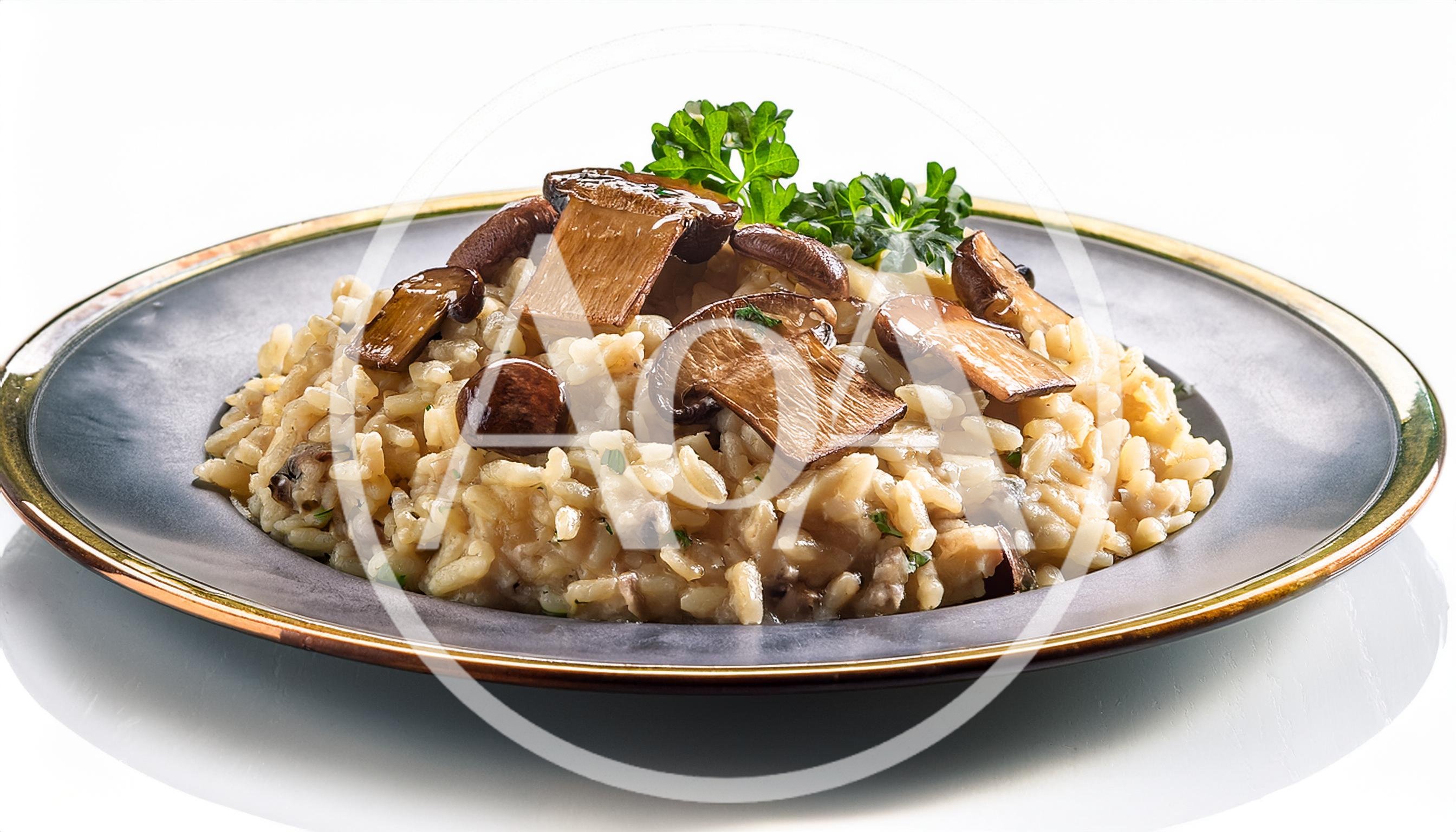 Mushroom Risotto Served on a Dark Ceramic Plate