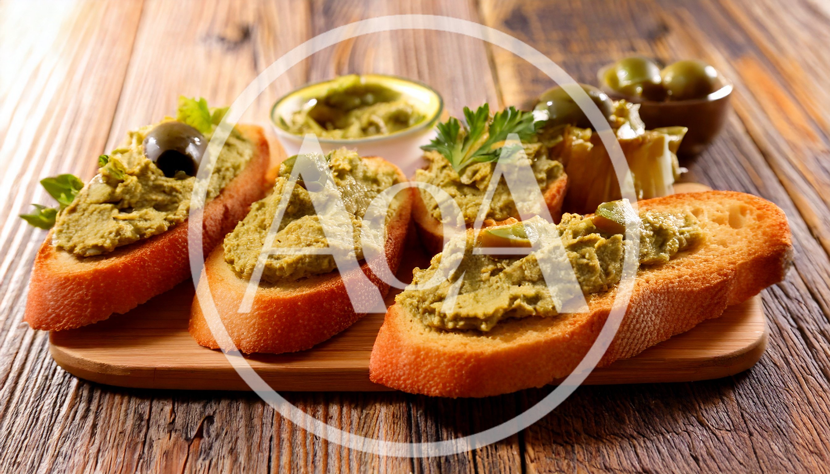 Olive Tapenade Bruschetta Appetizers on Wooden Board