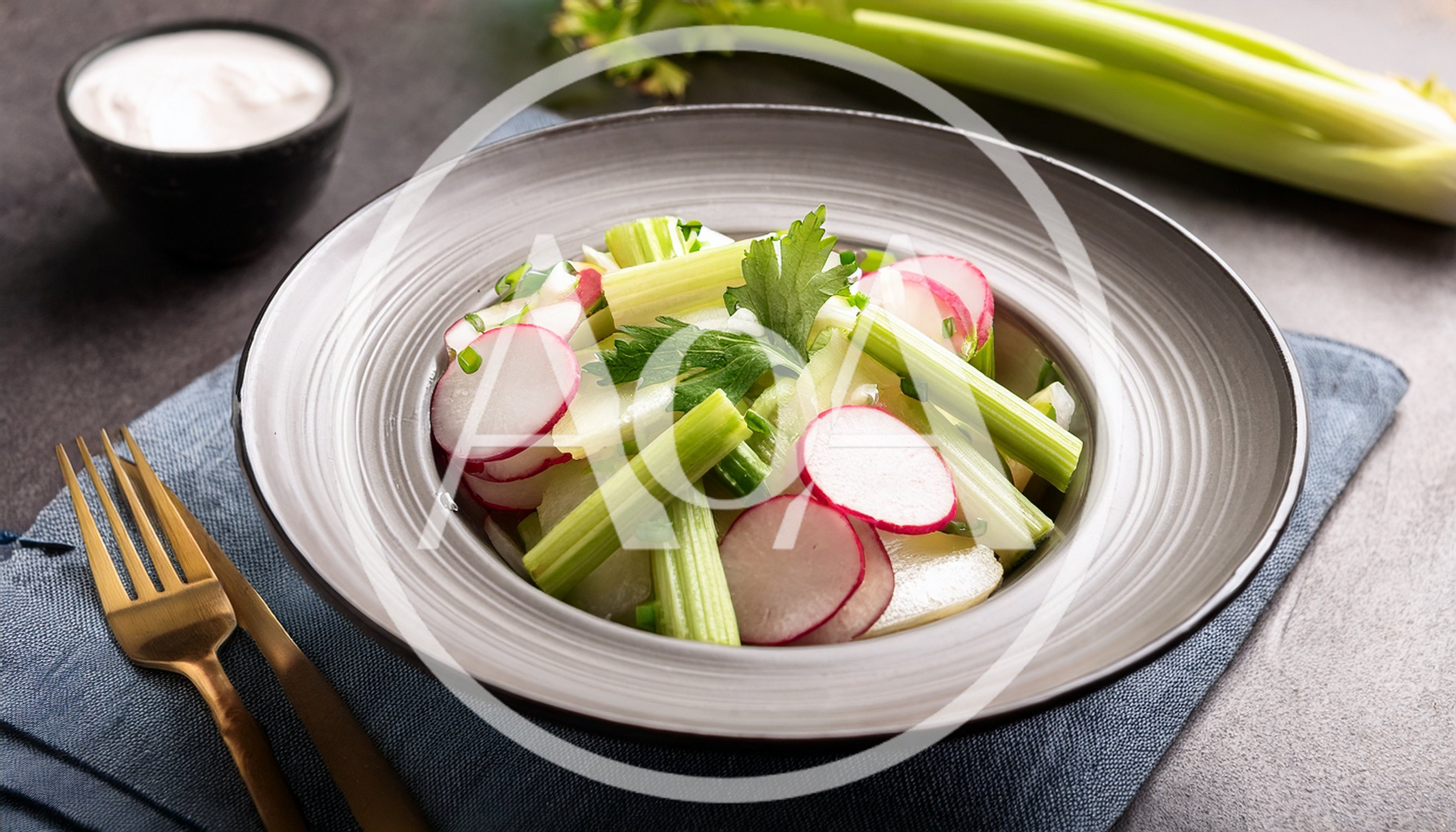 Fresh Celery and Radish Salad in Grey Bowl