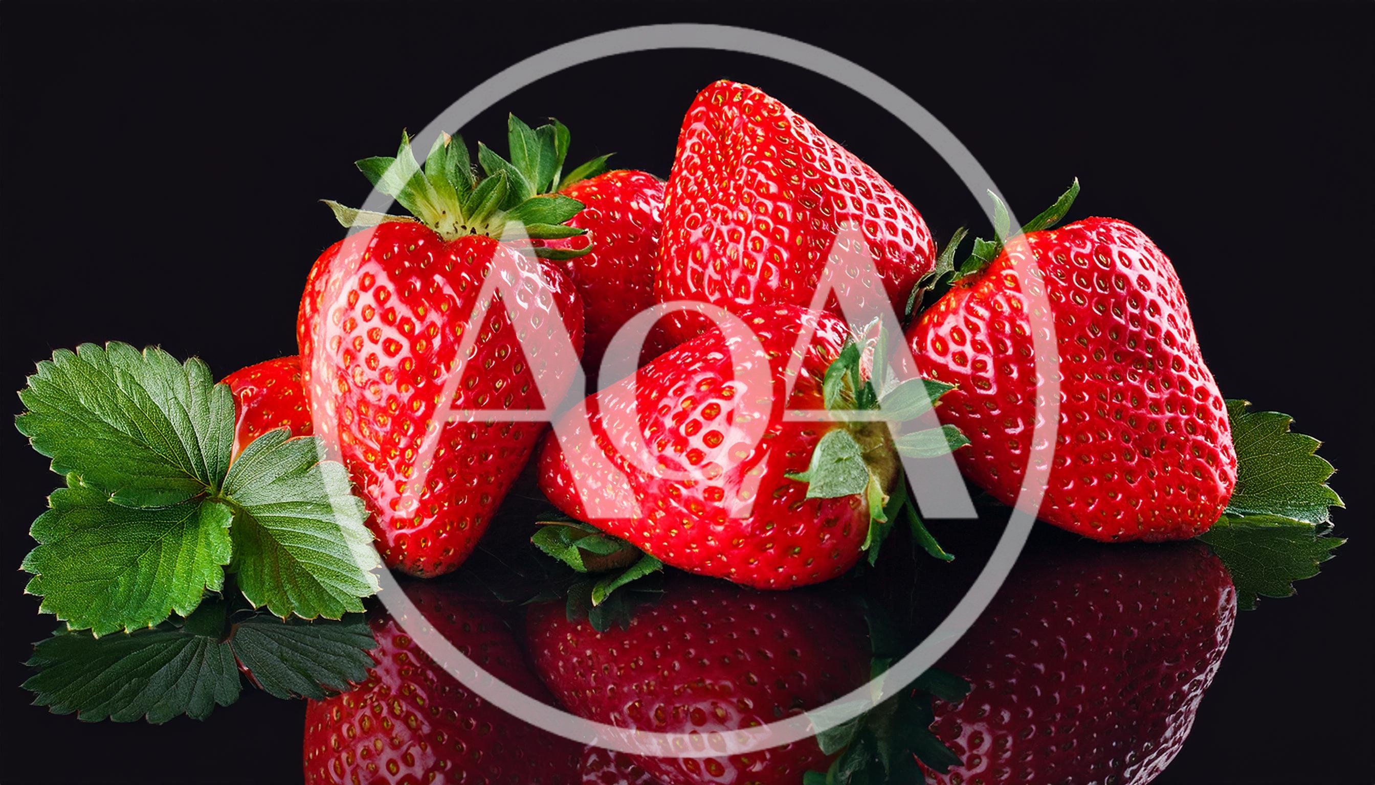 Fresh Red Strawberries With Green Leaves On Black Background