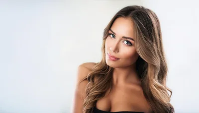 Portrait Of A Beautiful Young Woman With Wavy Hair