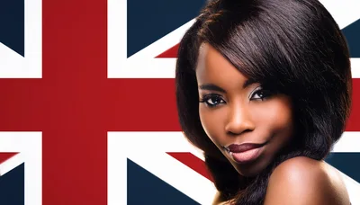 Portrait Of A Beautiful Woman Against British Flag