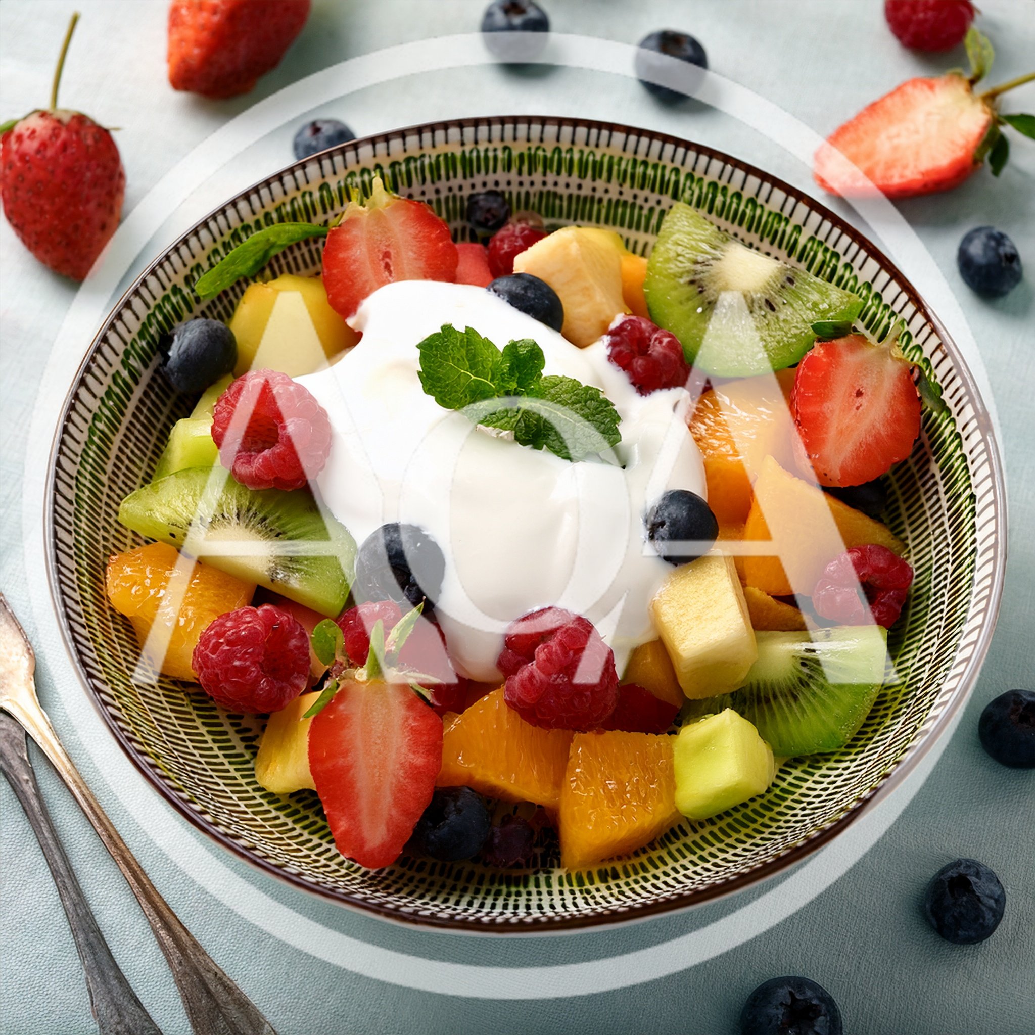 Fresh Fruit Salad Bowl With Yogurt And Mint