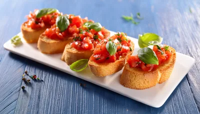 Fresh Tomato Bruschetta Appetizer on White Platter