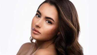 Portrait Of A Beautiful Young Woman With Wavy Hair