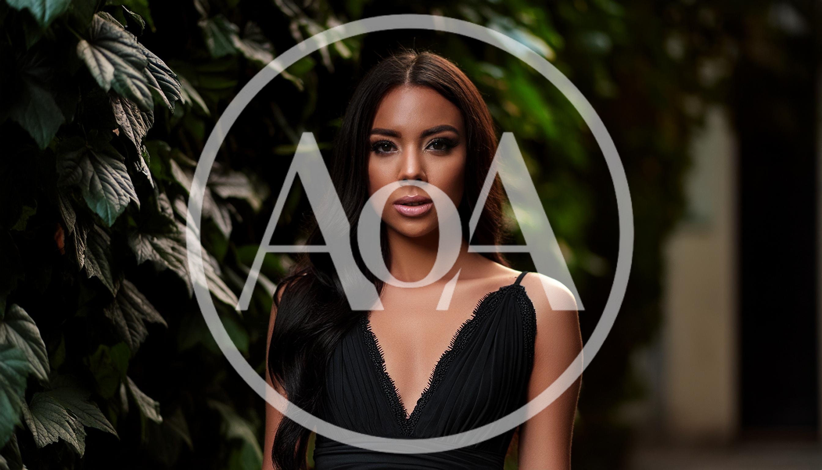 Portrait Of A Beautiful Woman In A Black Dress