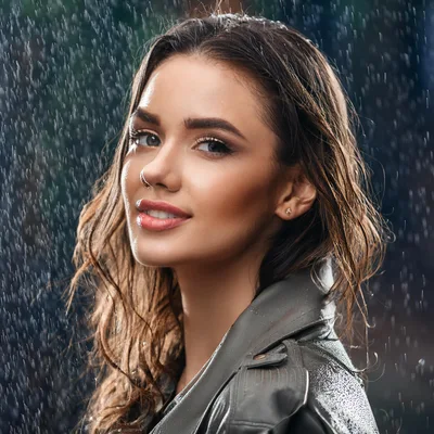 Portrait Of A Beautiful Woman In The Rain