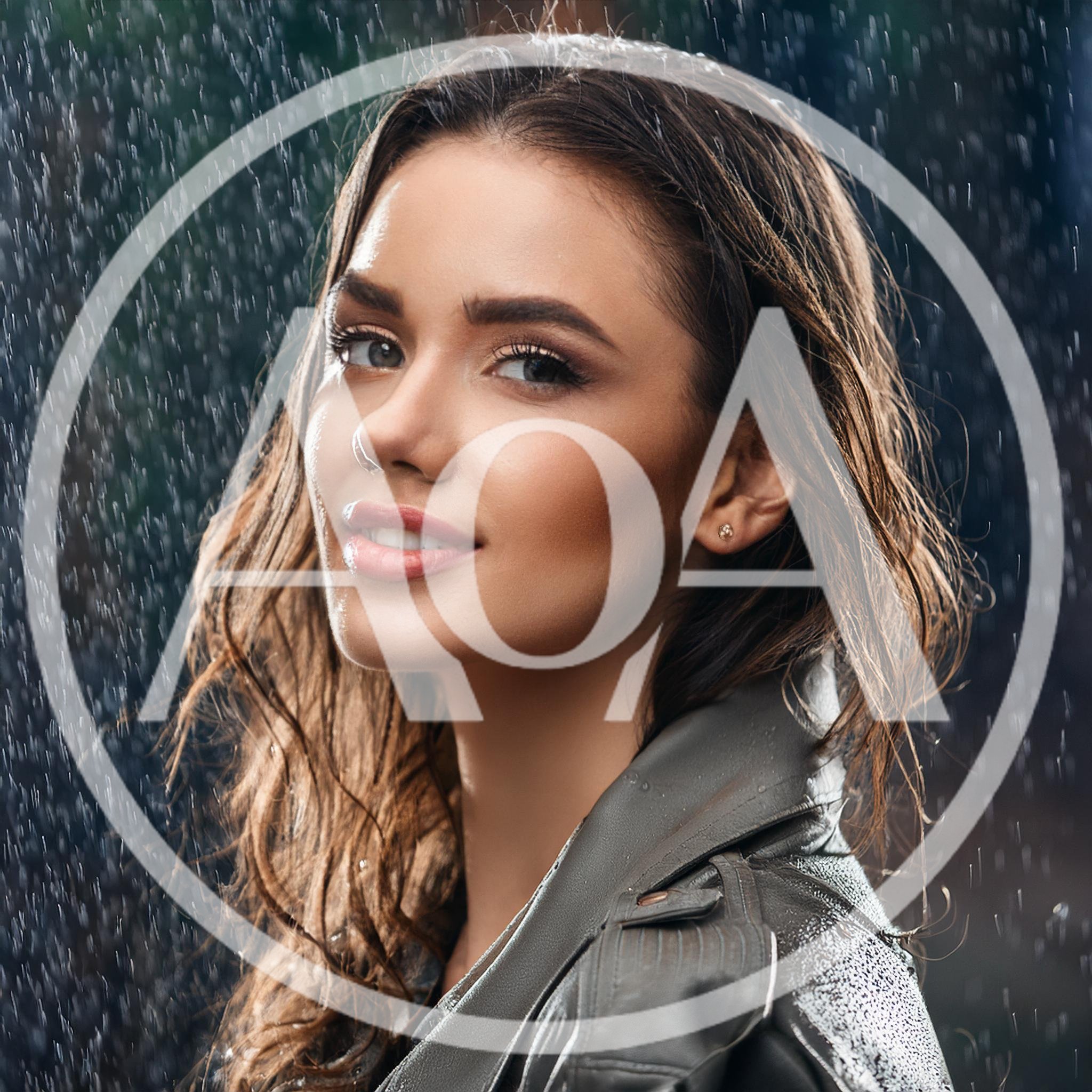 Portrait Of A Beautiful Woman In The Rain