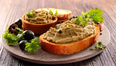 Tapenade Spread on Toasted Bread with Olives