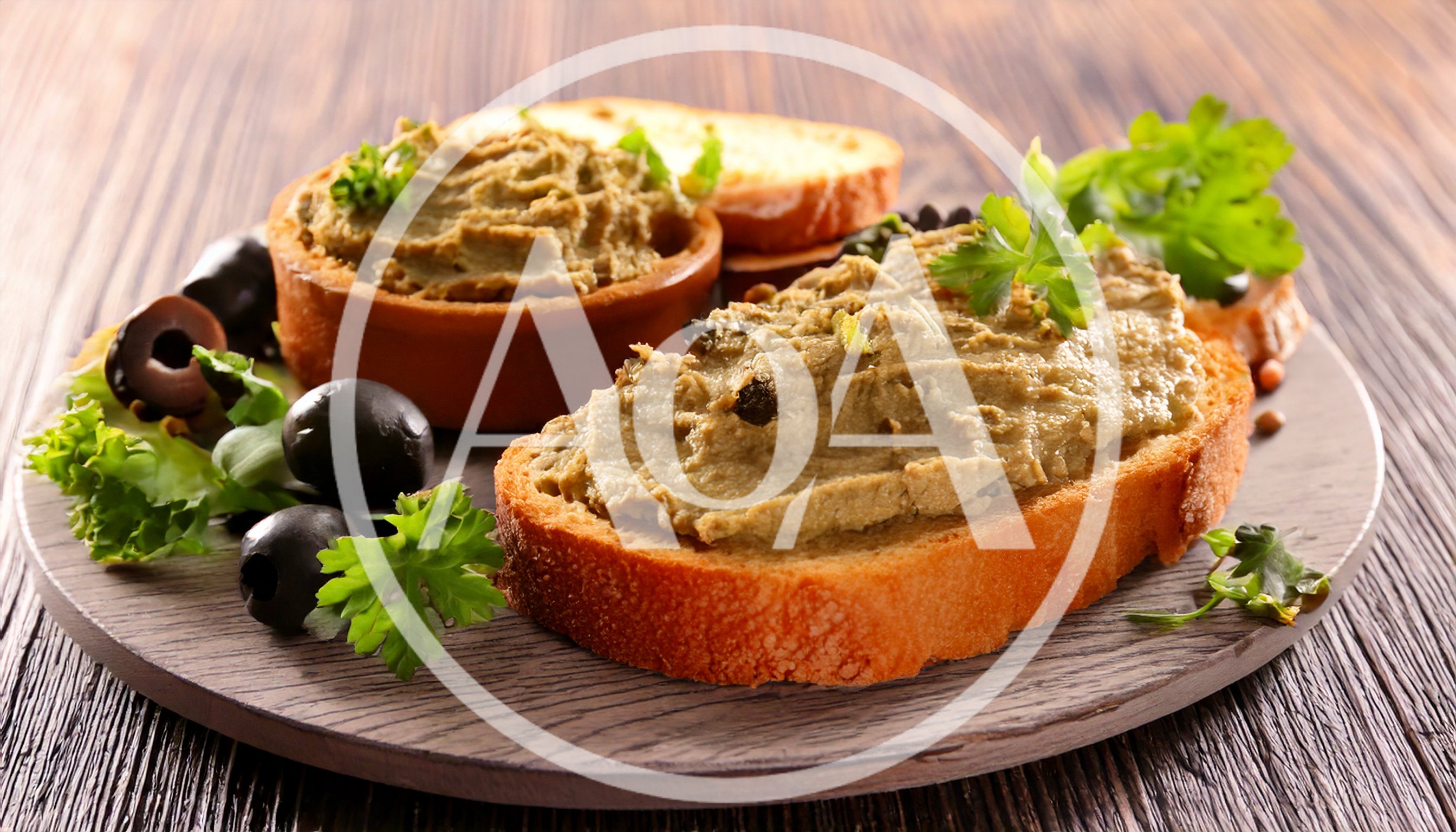 Tapenade Spread on Toasted Bread with Olives